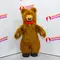 Надувной костюм бурого медведя с красным бантом